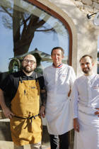 Chefs Julien Allano, Christophe Bacquié, and Bérard standing together outside La Bastide, Capelongue, for a collaborative six-hands Michelin-starred dinner.