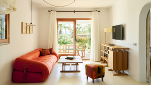 Lounge area with garden views in the Hibiscus Suite