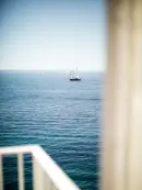 Sea ​​views with boats from a balcony of a Beaumier Hotel
