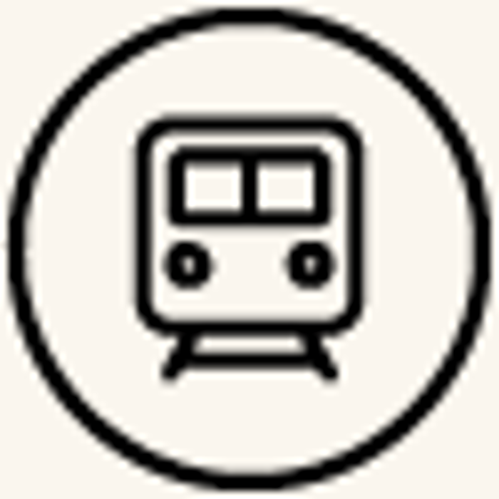 Une icône « Train » est élégamment affichée en noir sur un fond blanc.