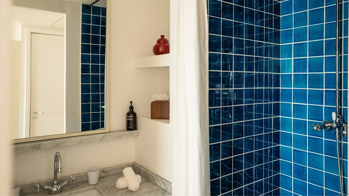 A photo captures a bathroom with each essential item properly arranged and neatly placed.