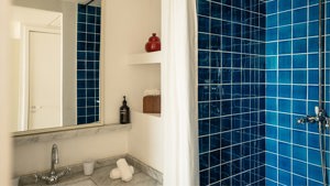 A photo captures a bathroom with each essential item properly arranged and neatly placed.