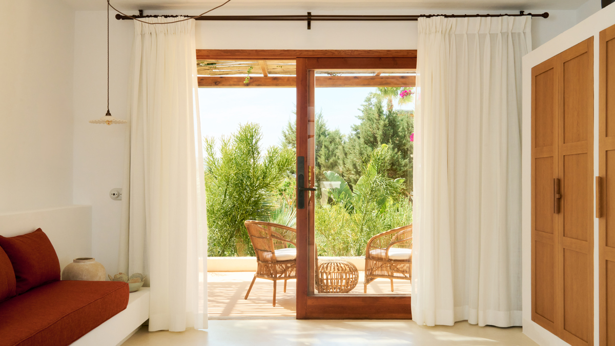 Lounge area with garden views in the Buganvillea Suite at Hotel Petunia Ibiza