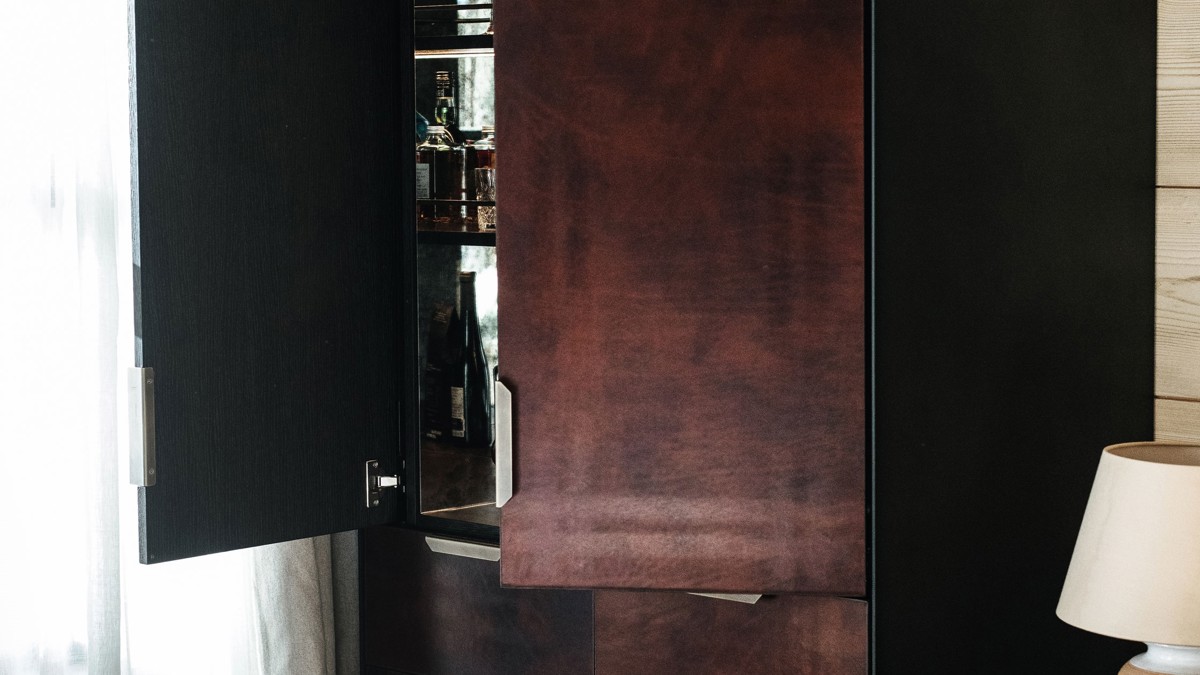 A clicked photo shows beautifully finished shelves in light brown color with open shelf doors.