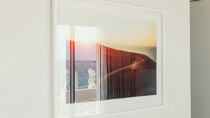 The reflection of the ocean is beautifully visible in the mounted portrait.